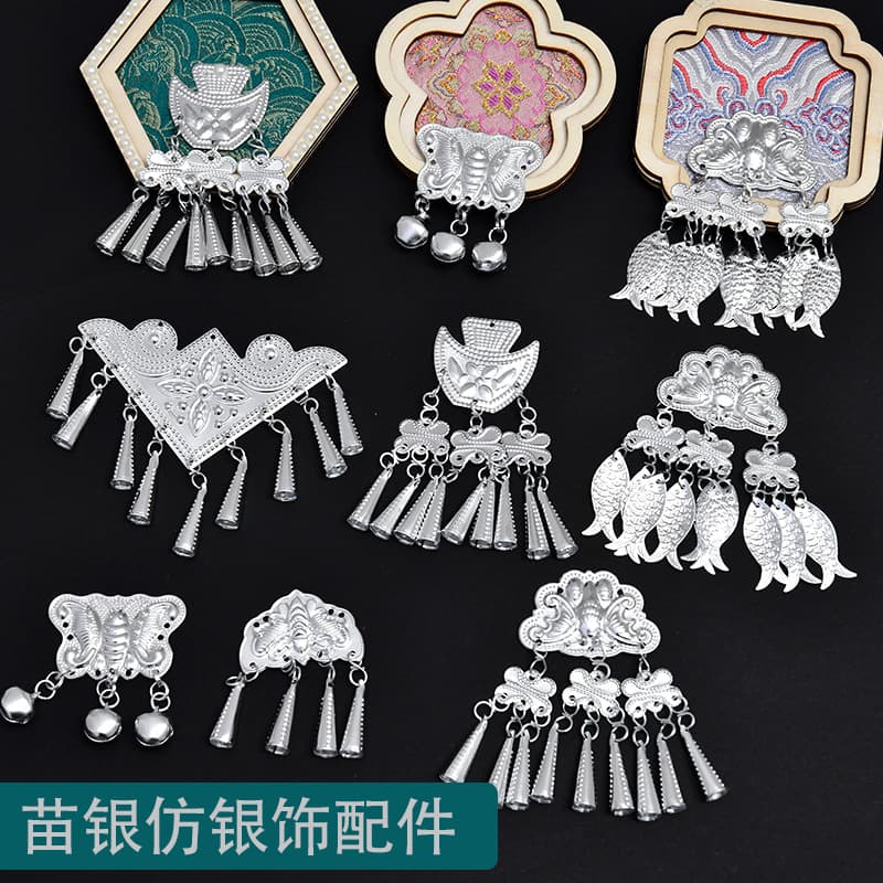 Miao handmade refrigerator magnet silver accessories, ethnic minority imitation silver ornaments, aluminum ornaments, silver pieces accessories, butterfly hanging bells