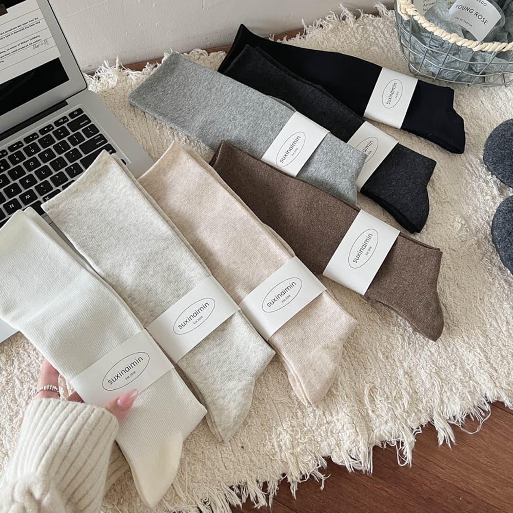 Suxinaimin pressure calf socks autumn winter women slimming leg shaping slouch long socks cotton matching boots knee-high socks.