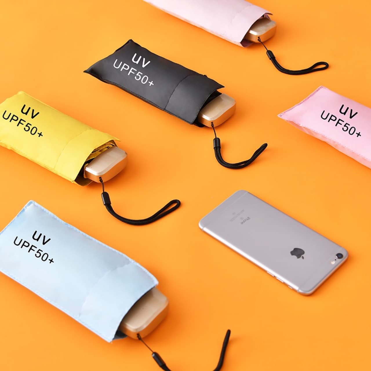 Bulk wholesale mini ultra-light sun umbrellas for women, UV protection, dual-purpose for sunny and rainy days, five-fold custom advertising umbrella.