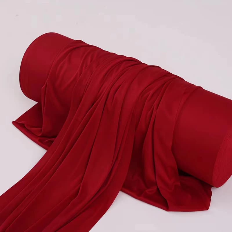 Milk silk ceiling fabric for wedding stages, available in bulk rolls including milk silk ceiling cloth and gauze curtains.
