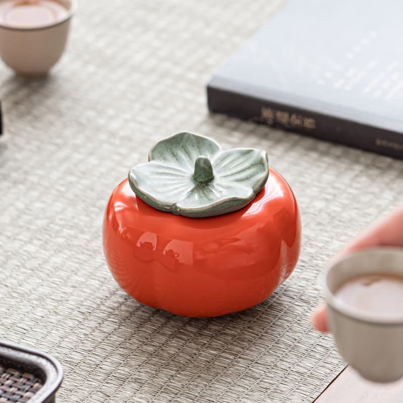 Creative wedding gift persimmon jars, ceramic companion gifts for tea or candies with auspicious designs.
