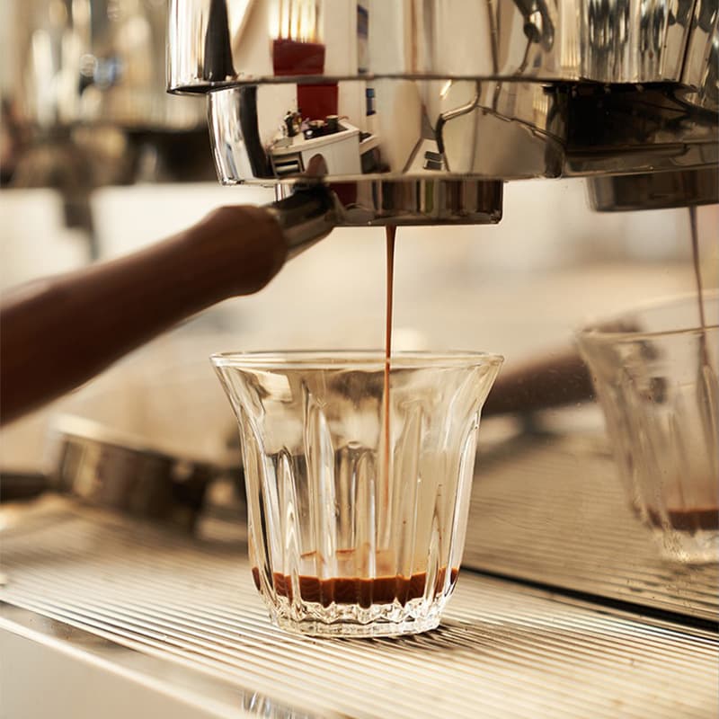 Vertical striped glass cup with latte art, minimalist retro dirty coffee cup, espresso cup, flat white cup, milk jug