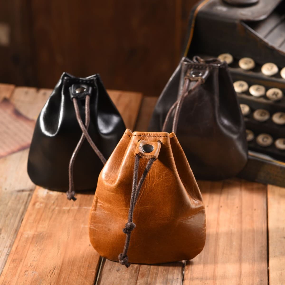 Retro genuine leather walnut coin purse pleated solid color drawstring coin purse for men large capacity portable compact storage