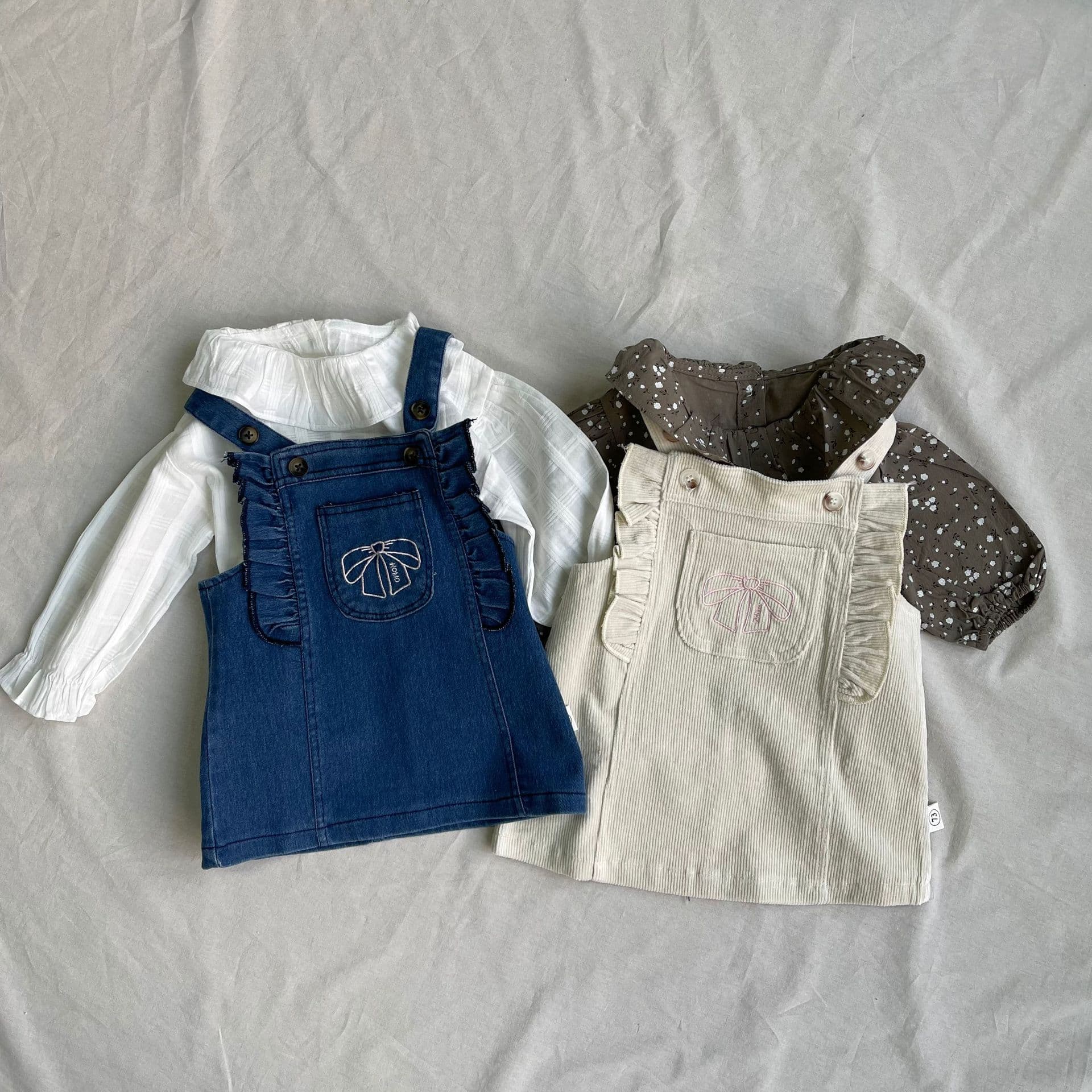 Korean style ins bow denim suspender skirt new outer wear infant and children's skirt design fashionable and versatile