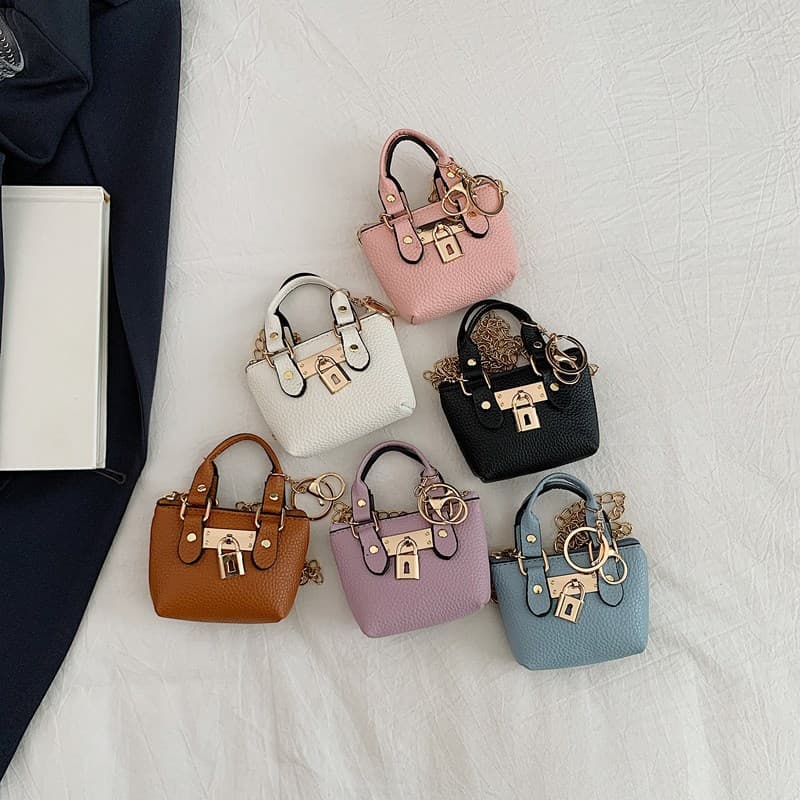 Korean style girls' cross-body hand-held small square bag 2026 summer new personality classic children's hand-held single shoulder cross-body bag