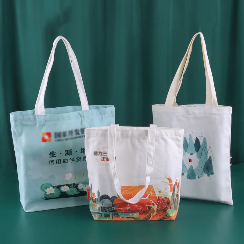 Wholesale minimalist color-printed promotional cotton bags, multi-colored student tote bags, candy gift storage pouches.