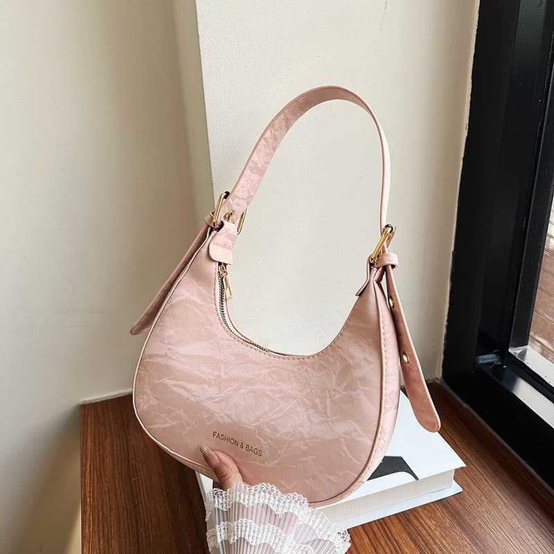 French niche design bag for women 2024 new fashion style versatile shoulder armpit bag super popular hand bag crescent bag
