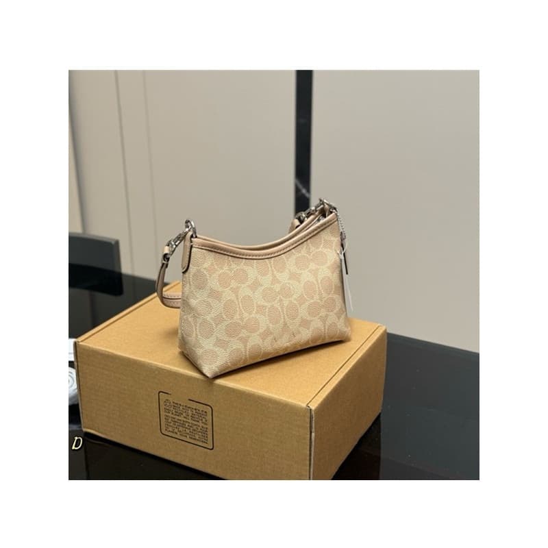 Coach's new Laurel mini hobo bag hobo armpit bag shoulder crossbody portable commuter mini crescent bag