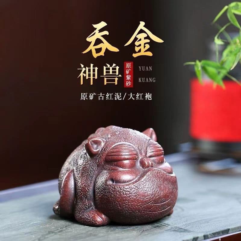 Yixing original purple clay tea pet three-legged money toad, gold-devouring beast Pixiu small ornament sculpture ceramic tea set wholesale.