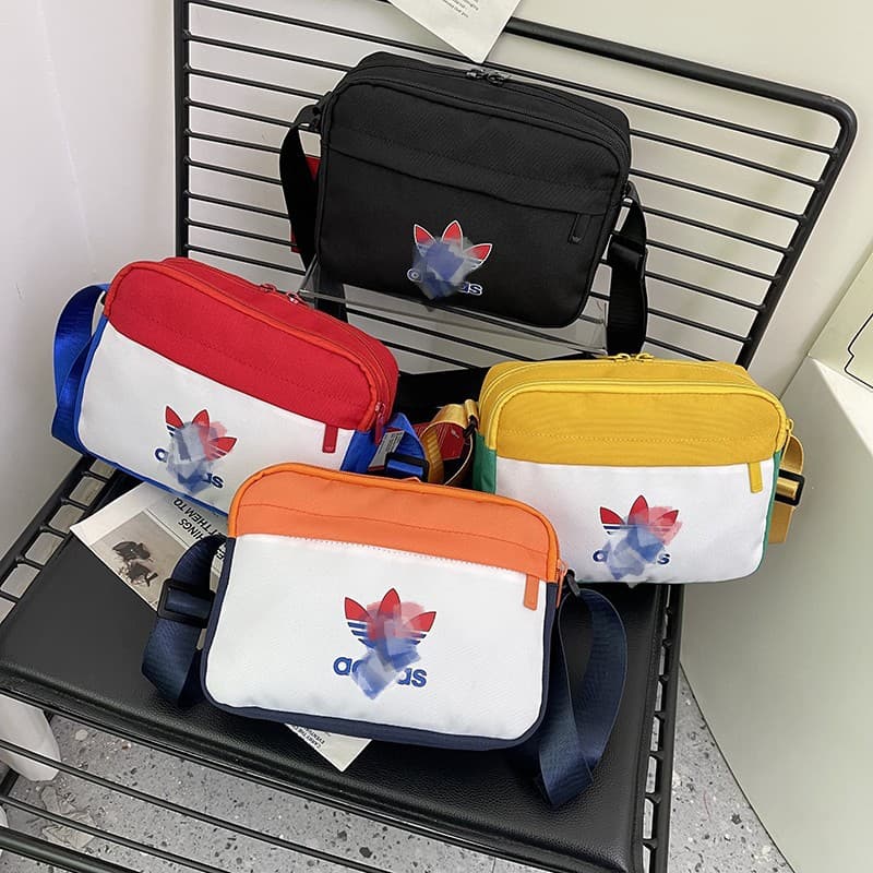 Cross-border clover crossbody bag for women, new travel style, casual minimalist phone bag, small crossbody bag, ins trendy brand, men's wear