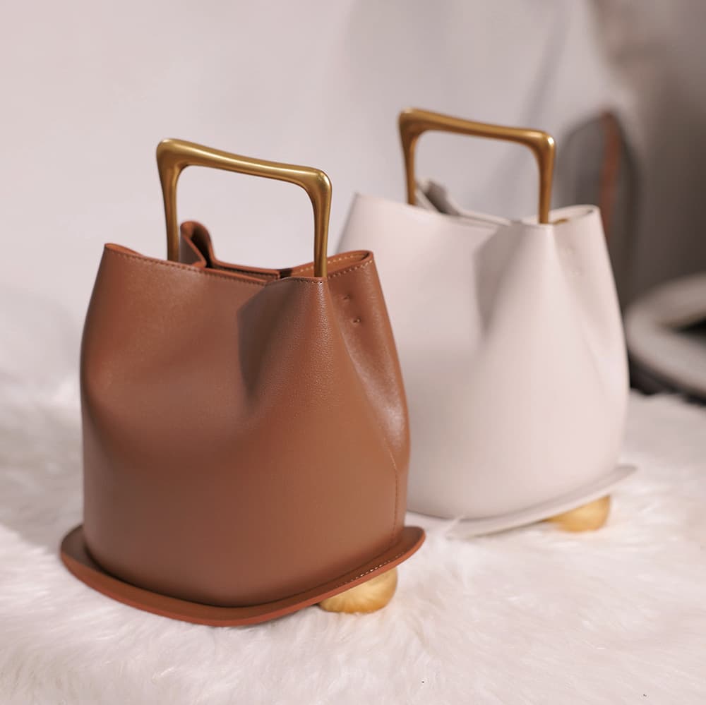 2026 New Imported Genuine Leather Women's Bag Premium Commuter Basket Bag Multifunctional Commuter Handheld Bucket Bag
