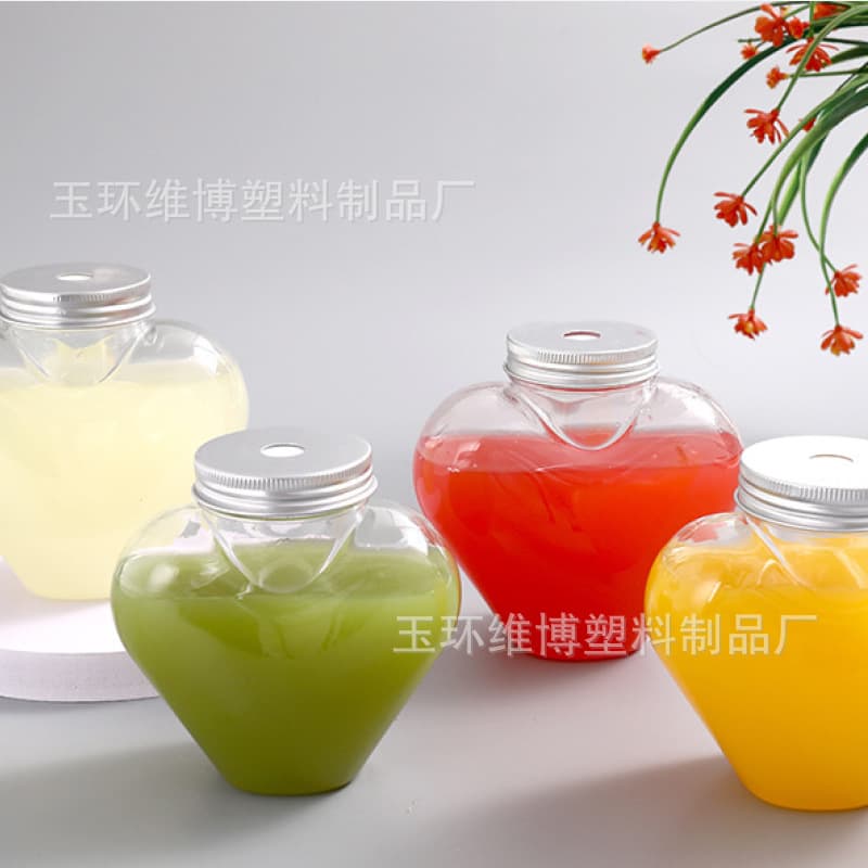 In-stock storage heart-shaped bottles, bubble tea bottles, thickened transparent 500ml PET sealing jars, high-aesthetic creative bottles for stalls.