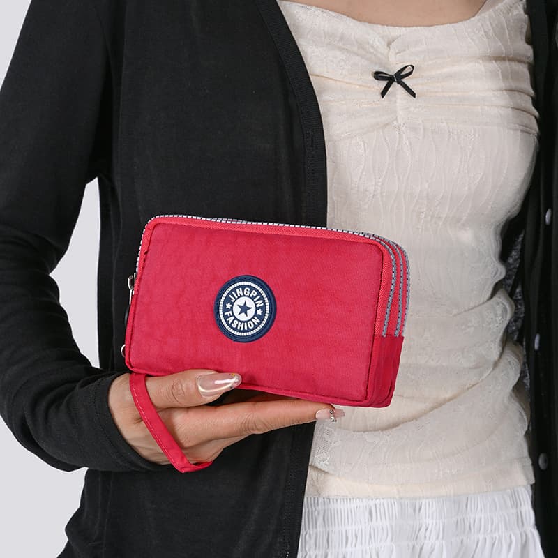 2026 New Trendy and Fashionable Women's Hand-Held Storage Bag for Coins, Small Items, and Mobile Phones
