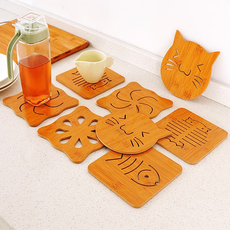 Hollowed-out wooden coasters, thickened kitchen mats, heat-resistant and non-slip placemats, bowl mats, plate mats, and coasters.