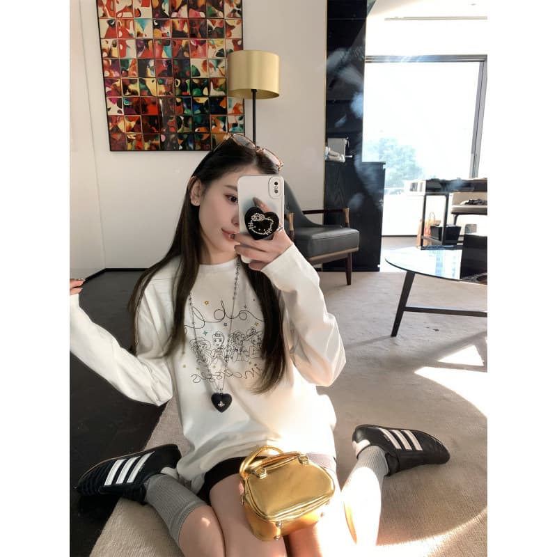 Korea Dongdaemun white printed bottoming shirt for women spring all-match loose round neck top pure cotton long-sleeved printed T-shirt