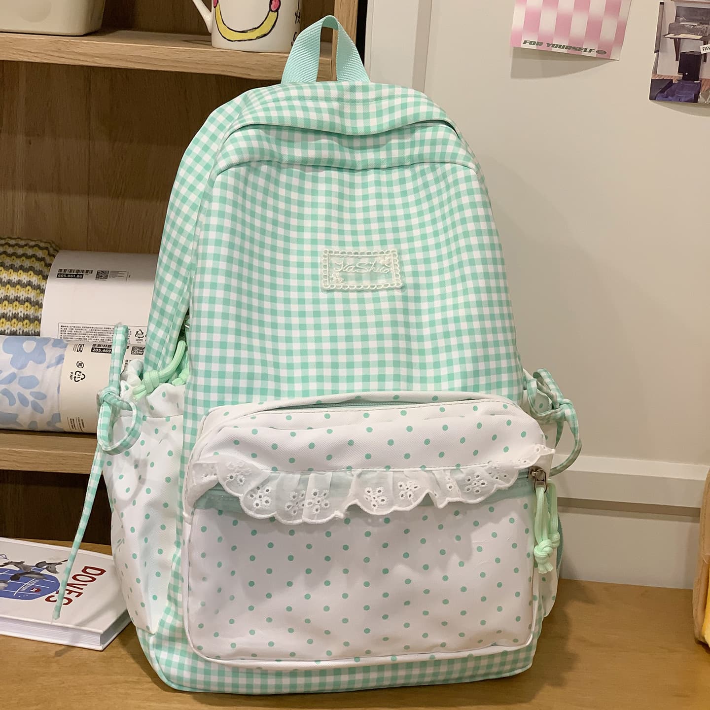 Korean-style fresh plaid and polka dot backpack with lace trim, cute small schoolbag for middle school, high school, and college students, commuter bag