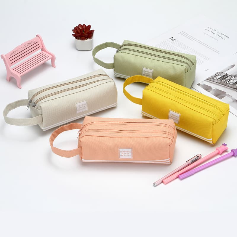 Creative large-capacity pencil bag, simple Oxford cloth double zipper pencil bag for male and female students, portable stationery bag with printed logo