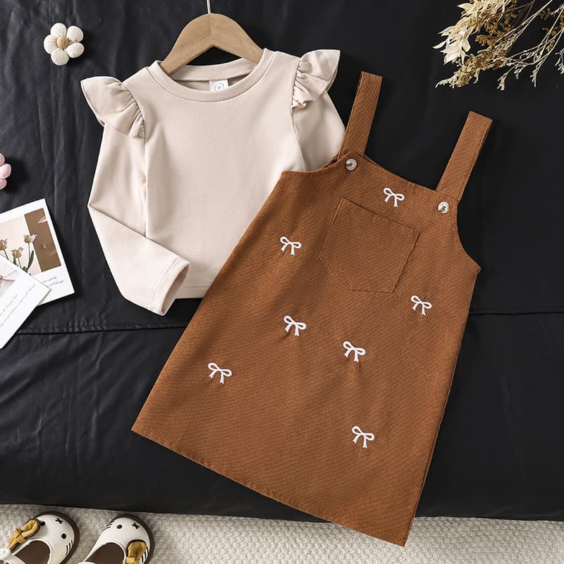 Girls suspender skirt suit foreign trade cross-border 2026 spring and autumn round neck small flying sleeves long-sleeved top bow suspender skirt