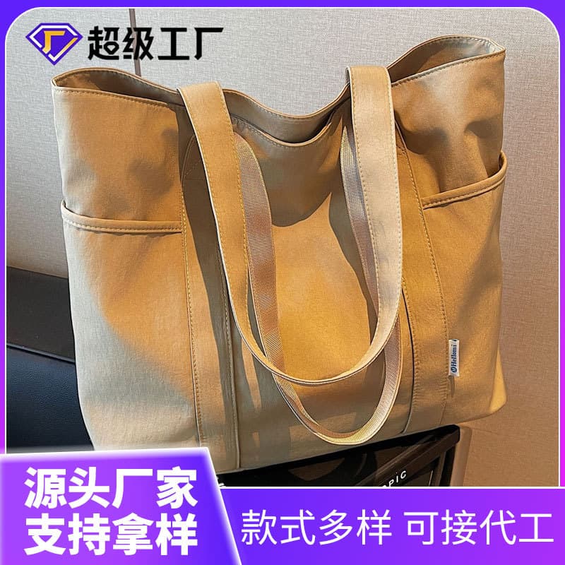 Canvas bag women's 2025 new summer casual large capacity commuter tote bag simple foreign style student shoulder bag