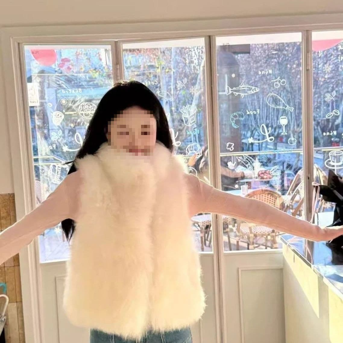 A structured, flattering vest with dropped shoulders that suits all heights and is versatile enough for women to wear. It features a fox fur faux fur lining.