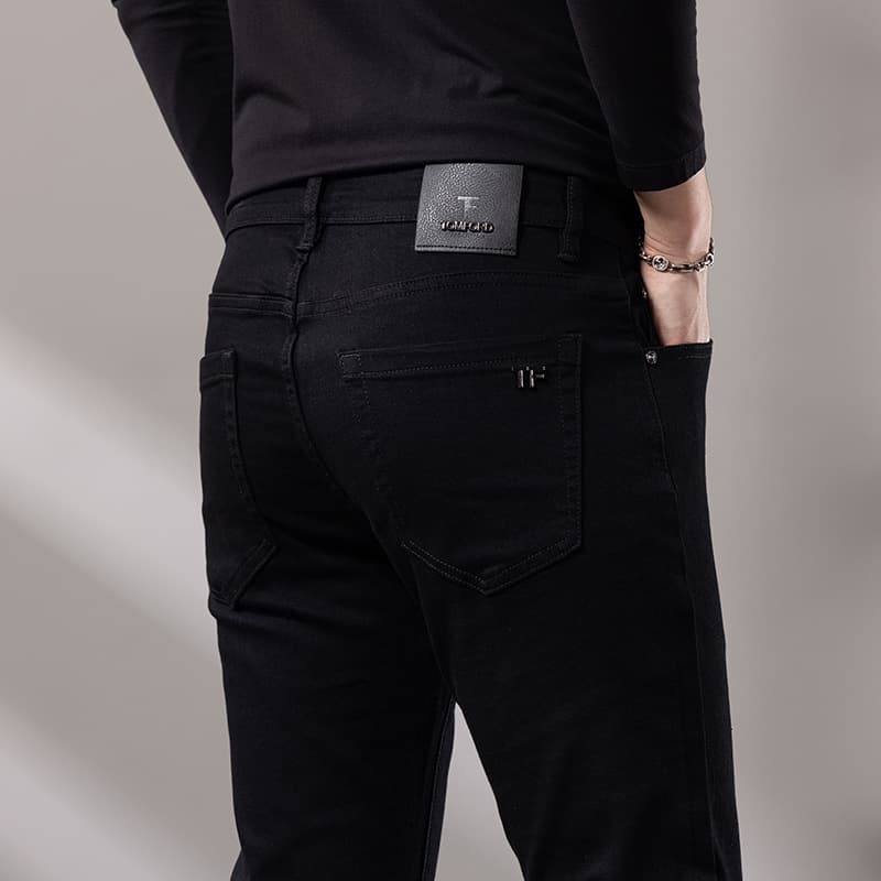 Guangzhou Xintang brand men's cross-border jeans men's black stretch small straight high-end pants foreign trade original standard