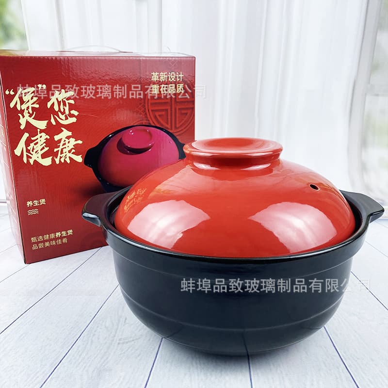 Red-lidded lithium ceramic casserole for open flame home use, soup stew pot, ceramic stone pot, practical festive gift with logo printing option