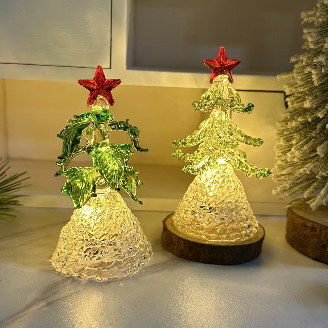 Illuminated glass Christmas tree decoration with lights, a glass tree ornament to create a festive atmosphere for the bedroom or living room.