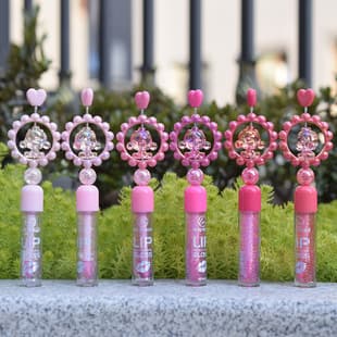 ML8096B New Heart-shaped Spinning Doll Export LUCKY MODEL Moisturizing Color Changing Lip Oil