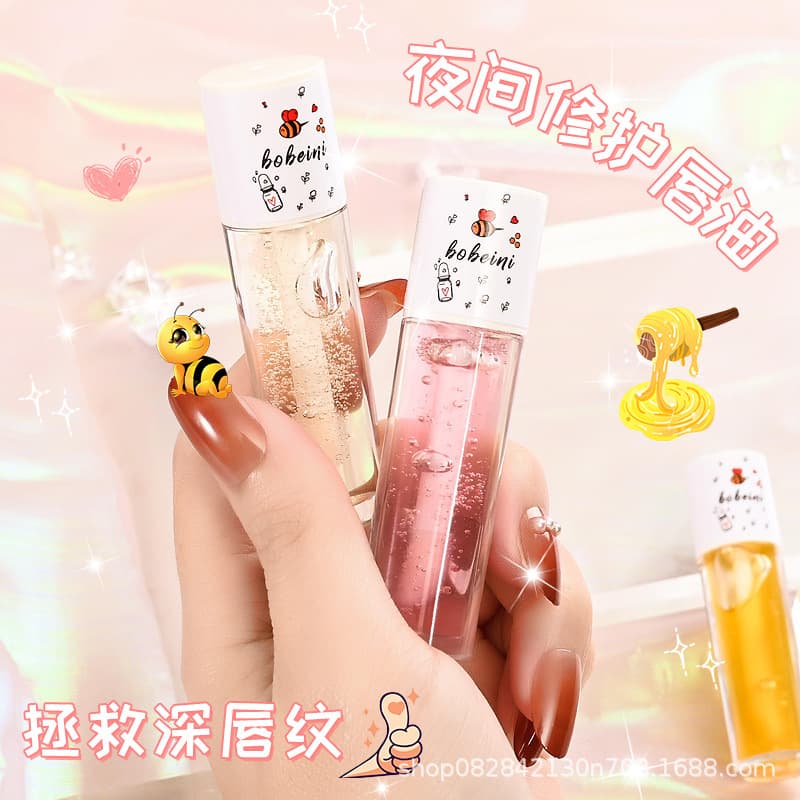 Baibeini Honey Lip Oil moisturizes, repairs, reduces lip lines, plumps lips, prevents dryness, and acts as a lip balm or lip mask.