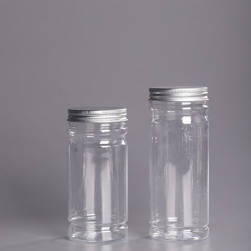 In-stock 60mm diameter transparent flower tea bottles, direct sale storage jars, PET plastic containers.