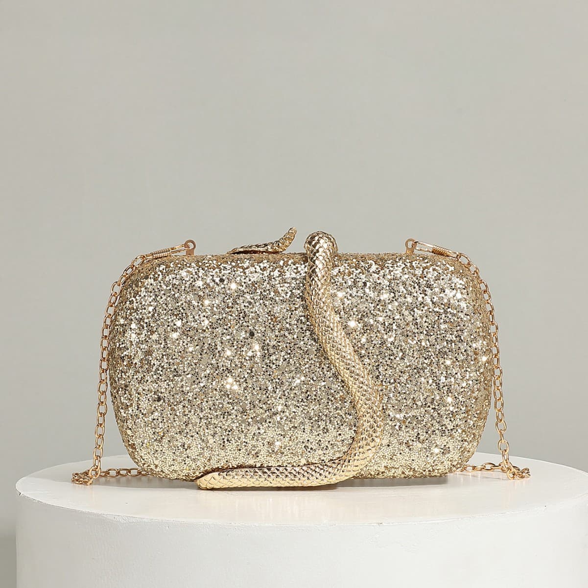 Cross-border wholesale European and American fashion snake-shaped party bag hand shoulder bag shiny women's bag spring new party bag