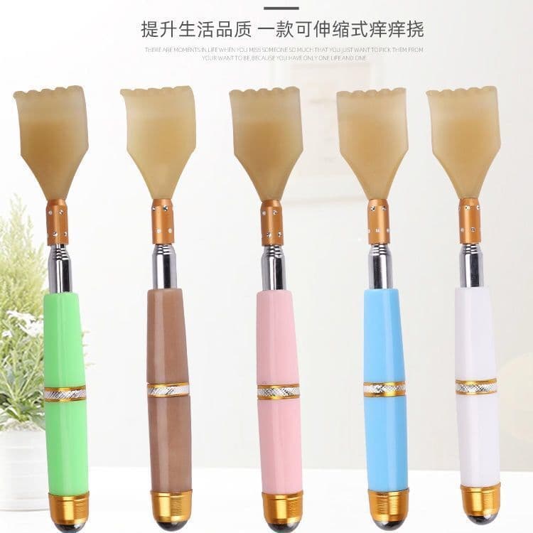 Magnetic bead extendable back scratcher with horn-like texture for acupressure