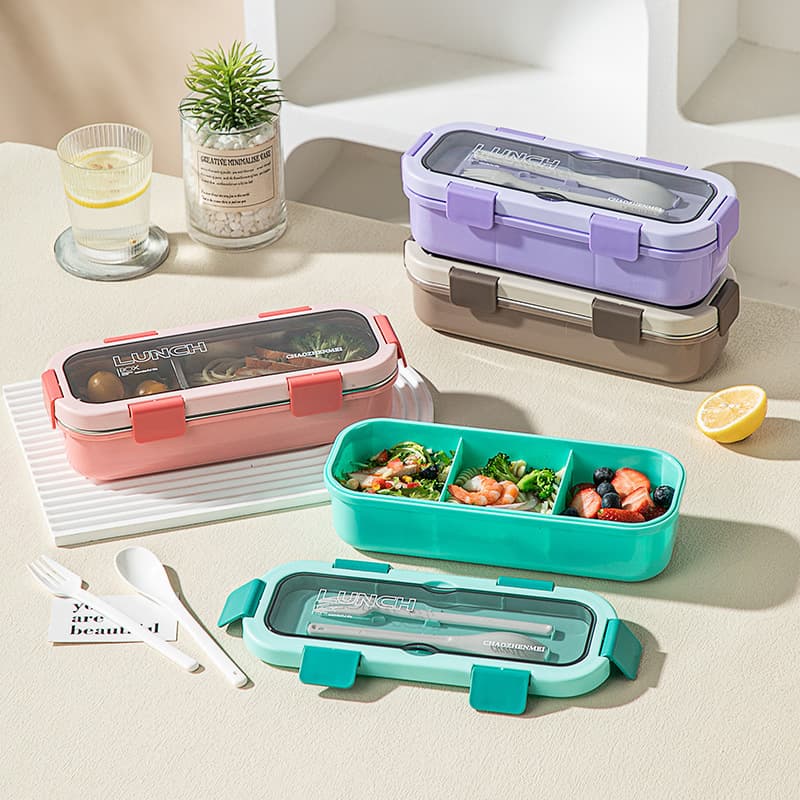 Simple single-layer compartmented lunch box with cutlery, microwave-heatable plastic sealed lunch box with lid and leak-proof lunch box