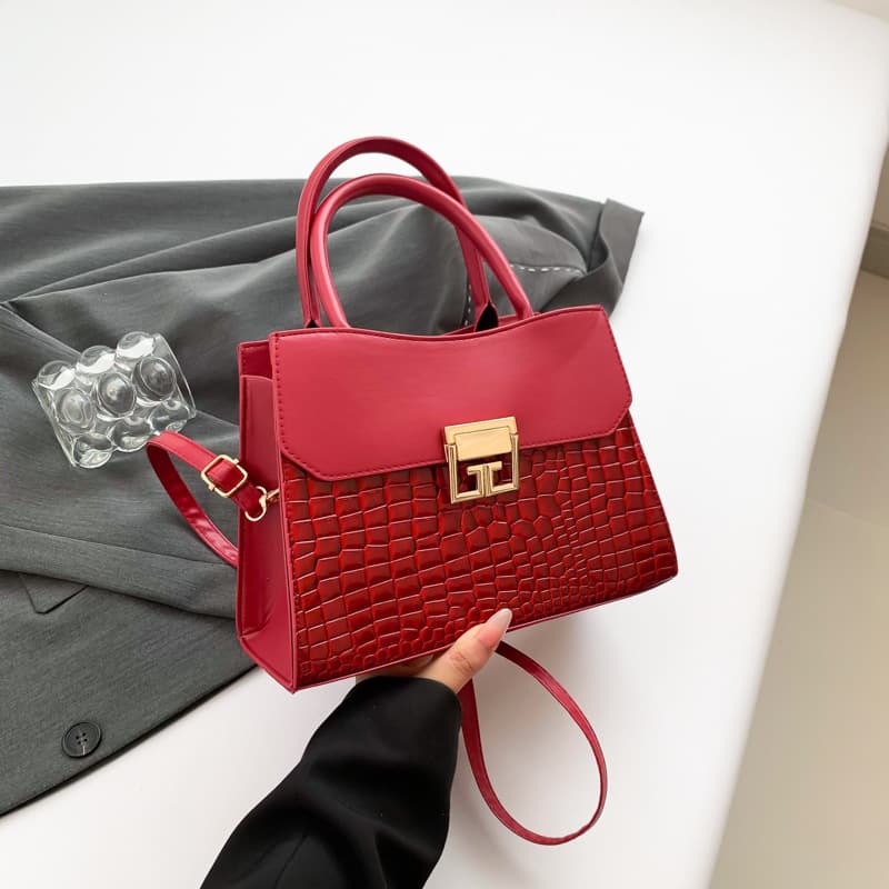 Hand-held pattern stitching solid color 2024 autumn new style elegant middle-aged elegant casual one-shoulder cross-body handbag