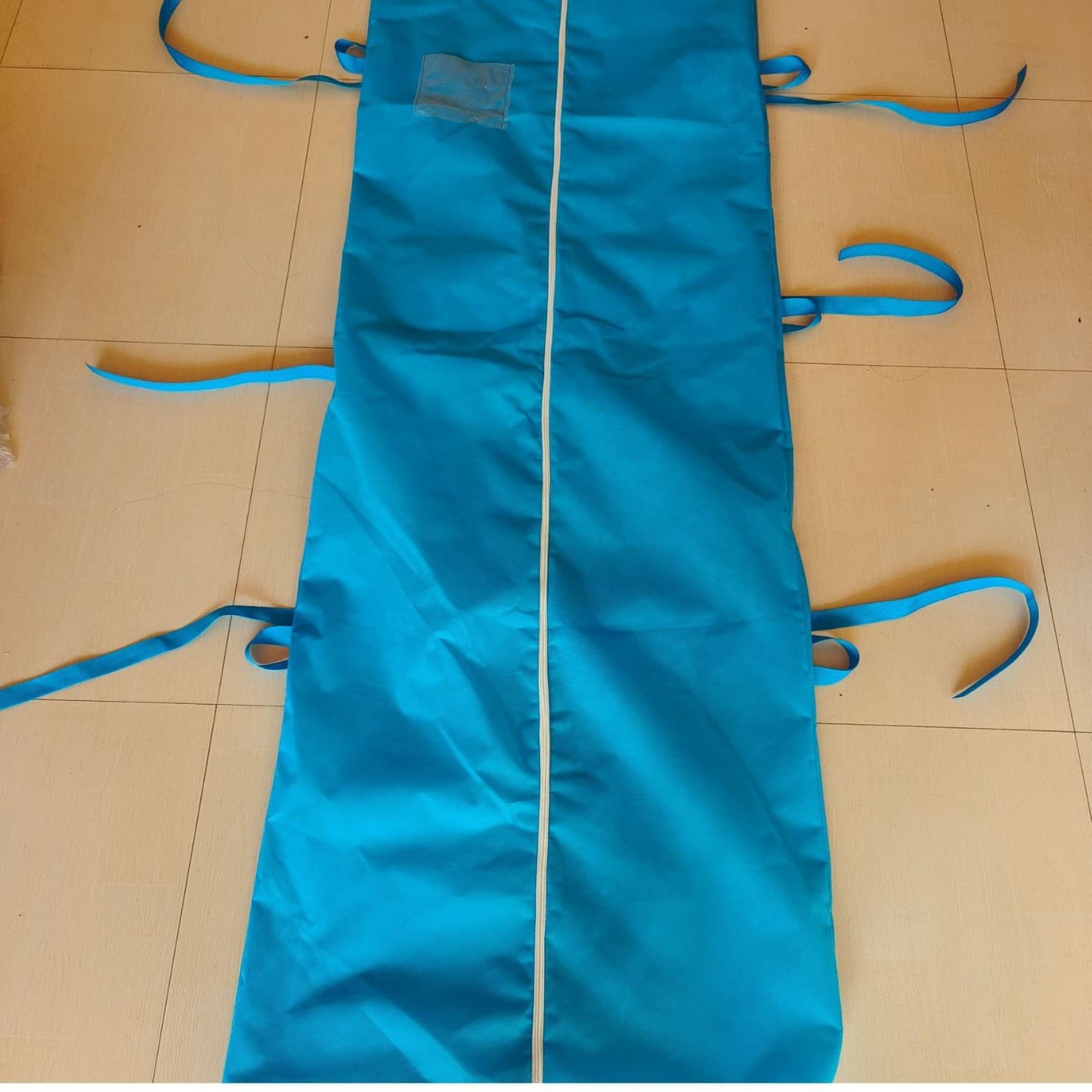 Blue non-woven body bags for funeral homes and hospitals, wholesale from Chaohuang Funeral Supplies.