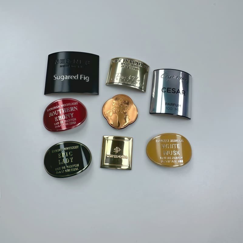 Manufacturer custom metal logo curved aluminum labels, aluminum alloy perfume aromatherapy bottle gift box packaging tags