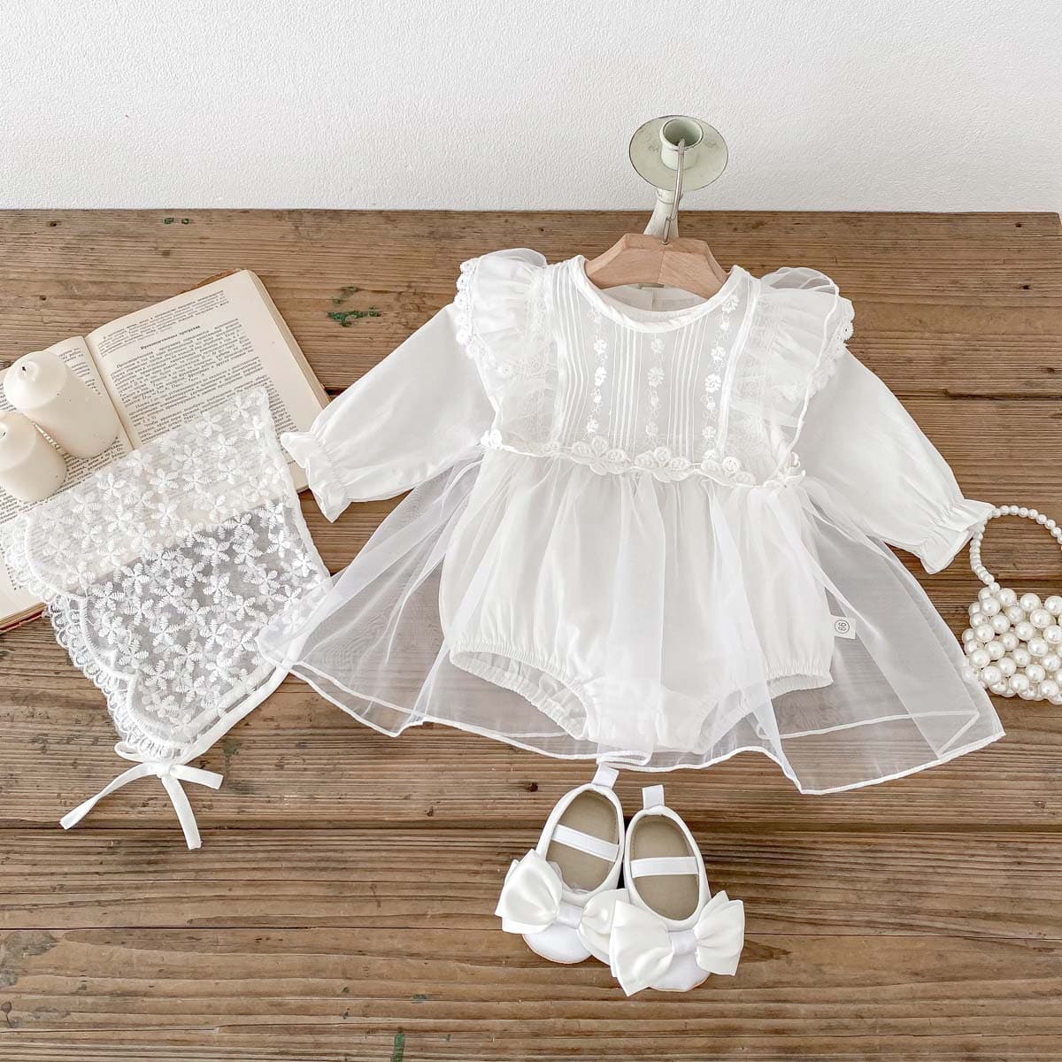 Spring baby jumpsuit for female baby with stylish flying sleeves and fart cover for newborn one year old mesh princess crawl suit
