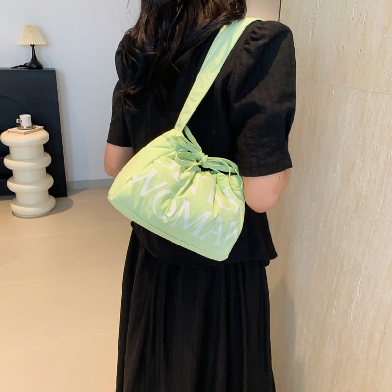 Thailand Gentle Woman niche design dumpling bag letter print drawstring shoulder armpit bag women's shoulder bag