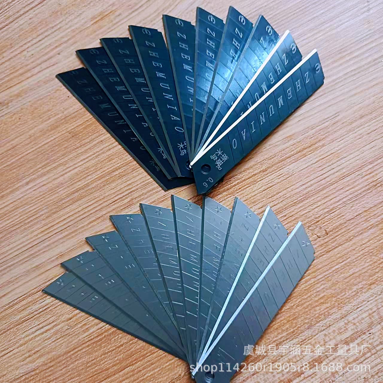 Factory wholesale Zhejiang Woodpecker brand utility knife blades, black, thickened, for cutting paper, wallpaper, and handmade items.