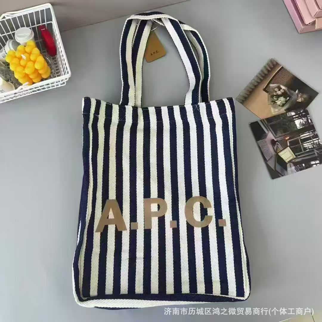 APC striped letter canvas bag large capacity student shoulder bag fashionable outing tote bag female hand shopping bag