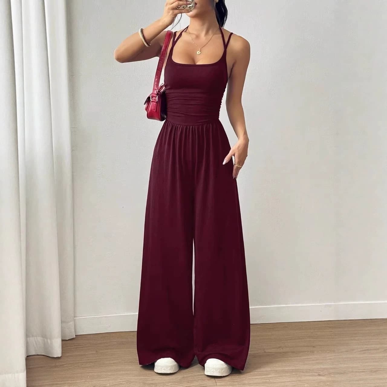 2026 Cross-border Women's Fashion Double Strap Solid Color Slimming Flared Jumpsuit Travel Vacation Backless Waist-cinching Yoga Pants