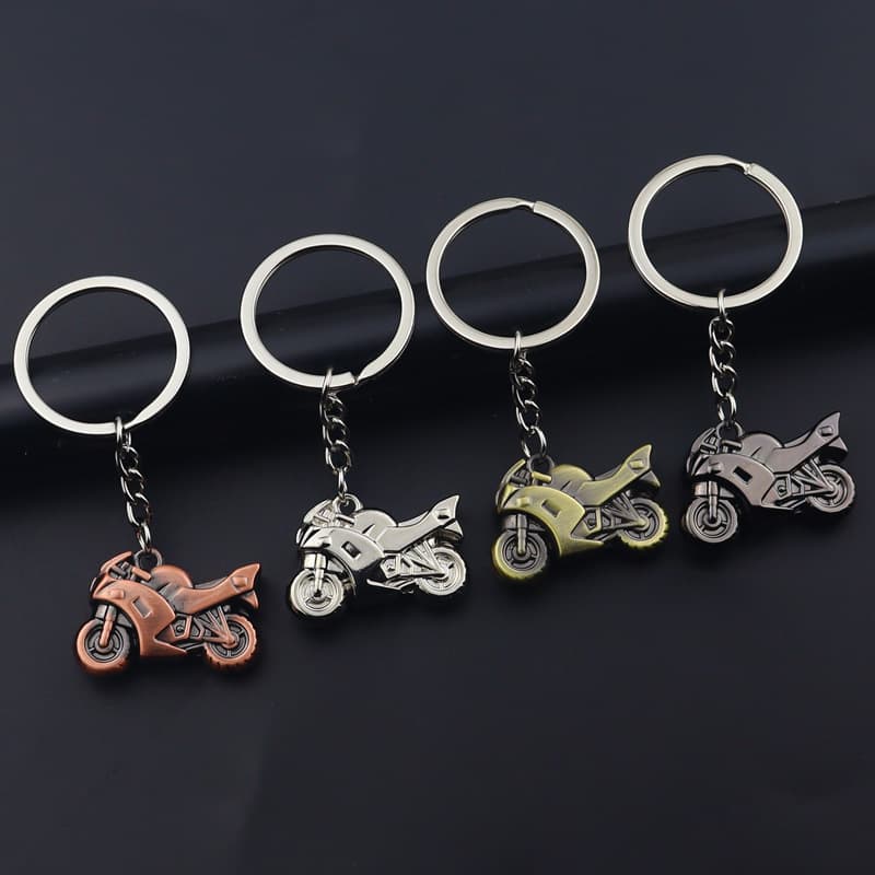 Metal motorcycle keychain pendant, 3D helmet motorcycle keychain, creative motorcycle keychain, school bag pendant