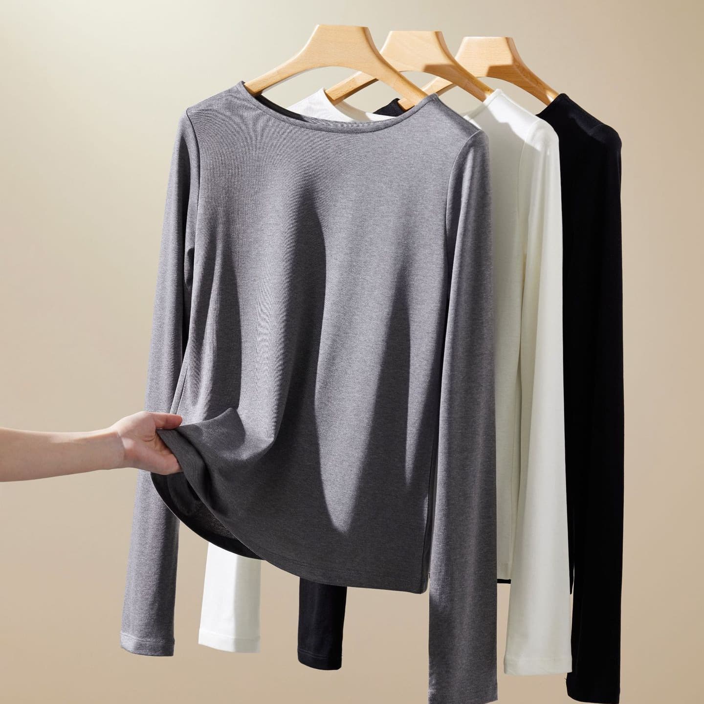 Elegant off-the-shoulder long-sleeved base layer top for women, made of heavyweight acetate Tencel, soft and slimming, perfect for layering.