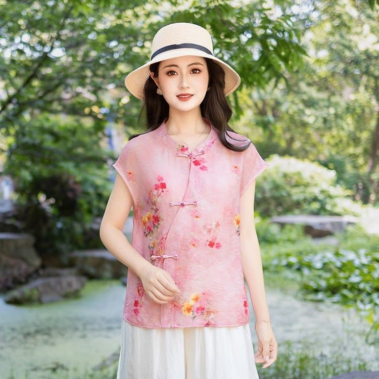 Elegant and comfortable sleeveless vest with pink floral pattern in Chinese style for middle-aged and elderly women, paired with white trousers