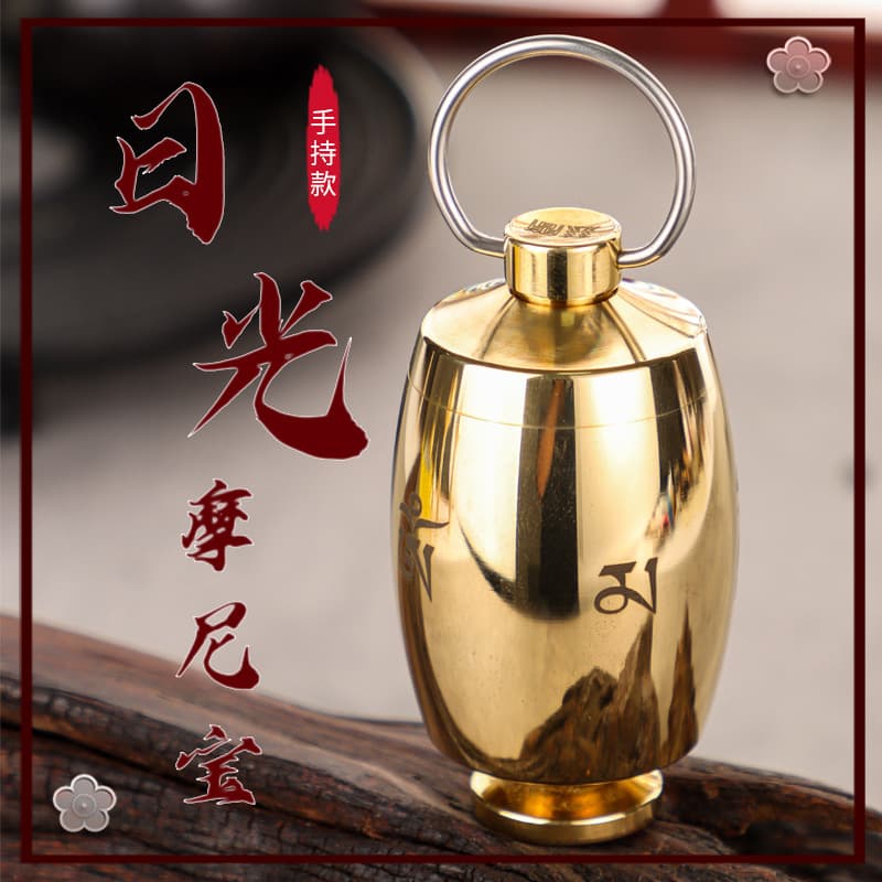 Pure copper handheld prayer wheel, household manual, sun-lit Mani jewel scripture, Avalokiteshvara mantra, sun-lit prayer wheel.