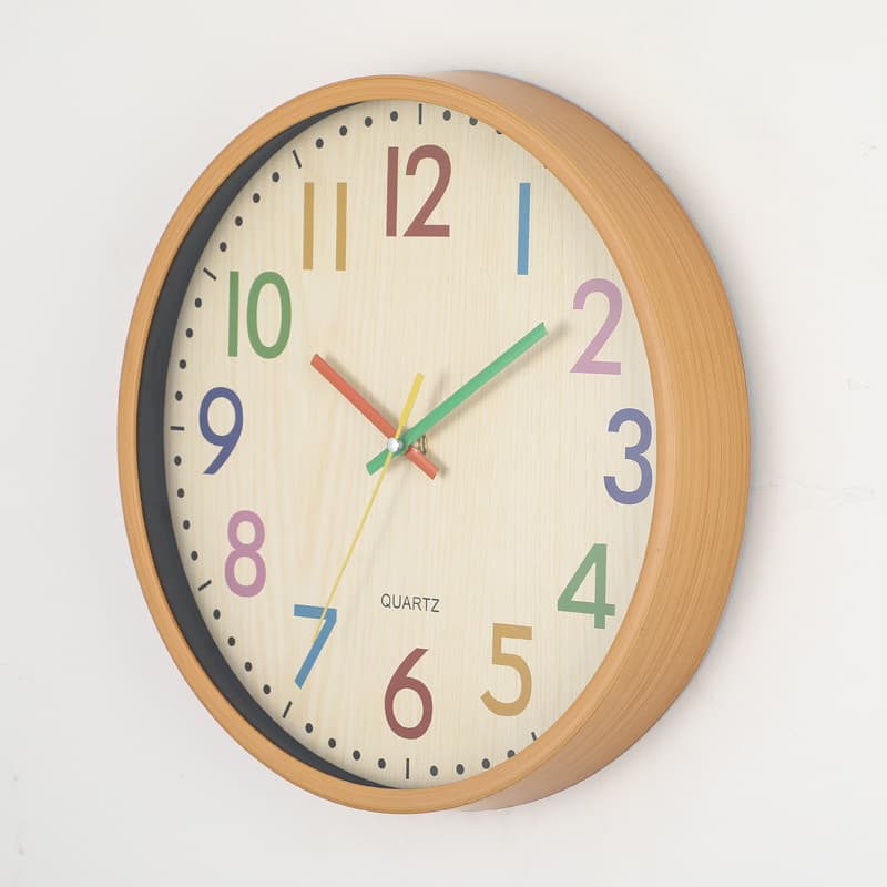 12-inch round, colorful, cartoon-style minimalist wall clock for bedroom, living room, or children's room.