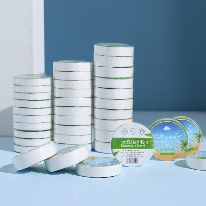 Youzhi disposable towels, compressed face cloths, non-woven for travel, hotels, and commercial catering wet wipes wholesale manufacturer.