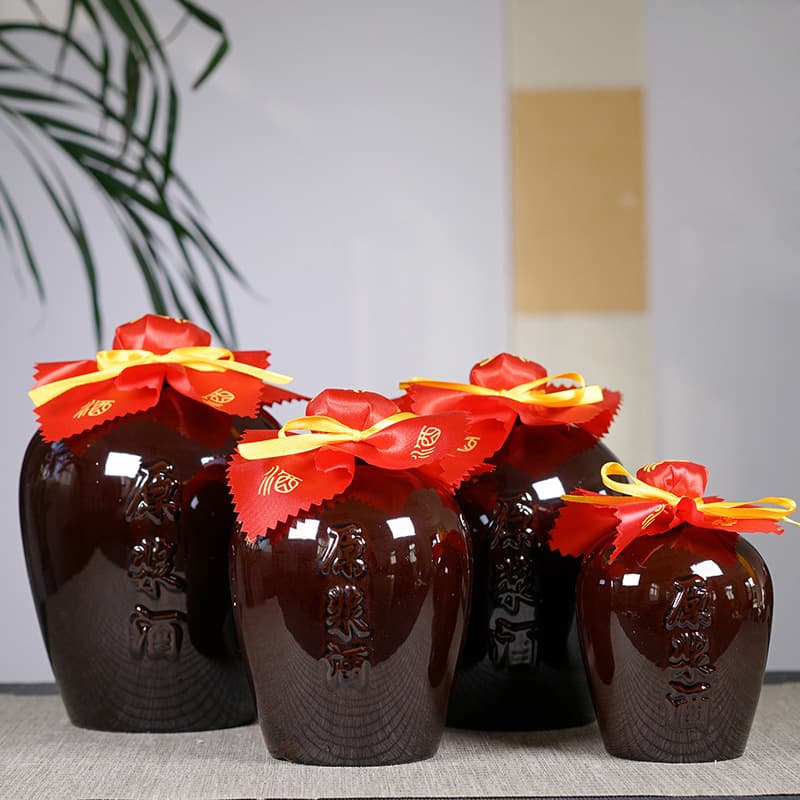 Ceramic wine jars in 1-5 jin sizes, handmade bottles for raw liquor, home-use containers from manufacturers.