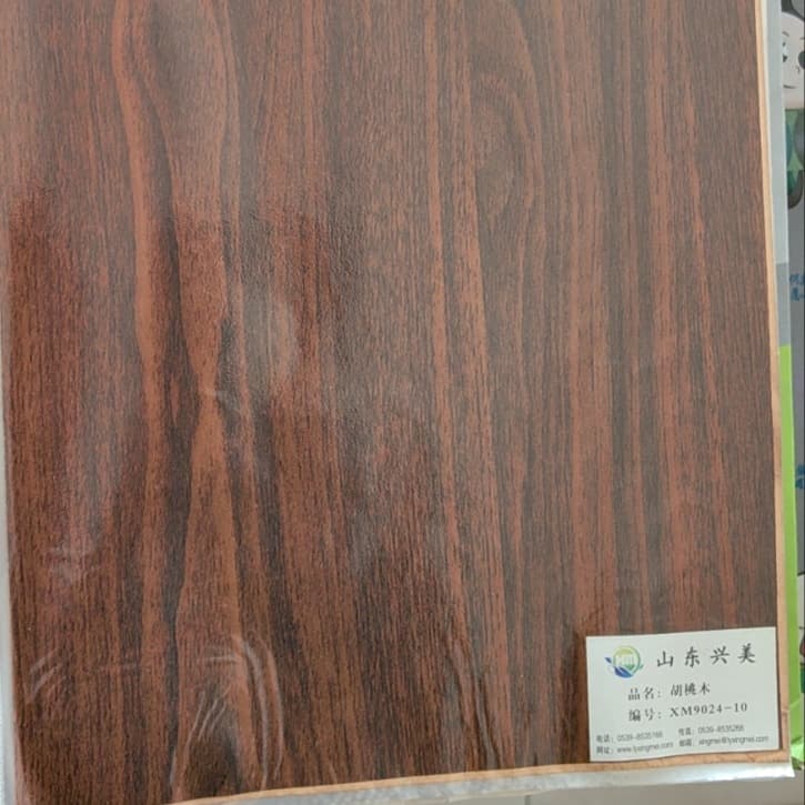 Manufacturer produces melamine impregnated paper, wood grain paper surfacing paper for eco-friendly boards, specialized impregnated paper for surfacing patterns