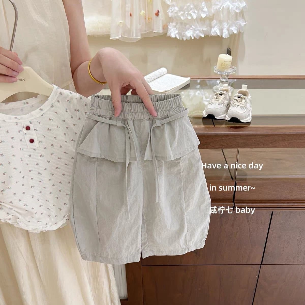 Summer new Korean style girls' summer Korean style floral short-sleeved shirt tops butt curtain pants two-piece set